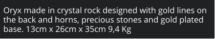 Oryx made in crystal rock designed with gold lines on the back and horns, precious stones and gold plated base. 13cm x 26cm x 35cm 9,4 Kg